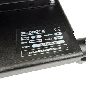 Black metal base for a Paddock™ 1,450 PSI Wall Mountable Pressure Washer, featuring a label with model number SPWM1450, serial number 20260830003, and technical specifications.