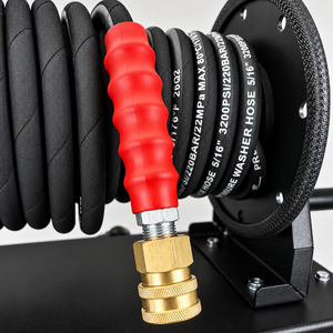 Black high-pressure hose reel for the Paddock™ 1,450 PSI Wall Mountable Pressure Washer, coiled with a red ribbed grip and a brass quick-connect coupling at the end.