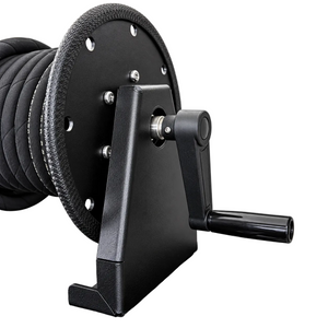 Paddock™ 1,450 PSI Wall Mountable Pressure Washer with Hose Reel, featuring a black wall-mountable high-pressure hose reel with a hand crank and a coiled black pressure hose.